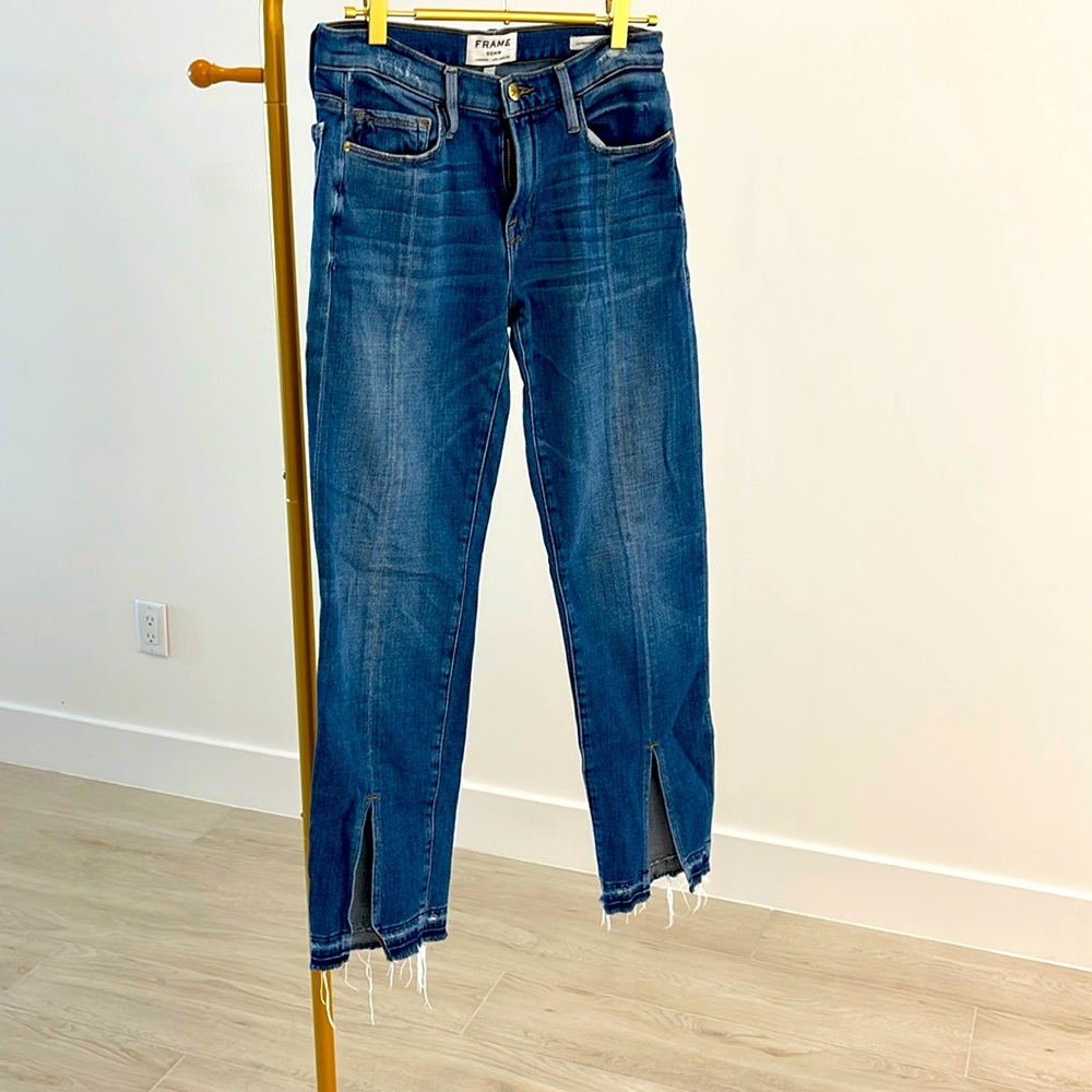 Frame denim size 26. Cropped, raw hem, both ankles front slip.